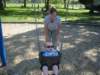 mummypushingliliontheswing_small.jpg