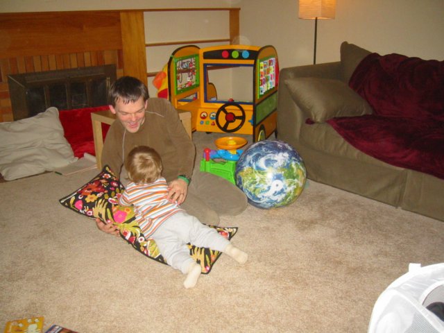 daddyholdsthecushionsolilicanknockitover.jpg
