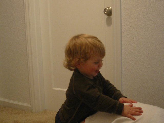 lilitriestoclimbonmummysback.jpg
