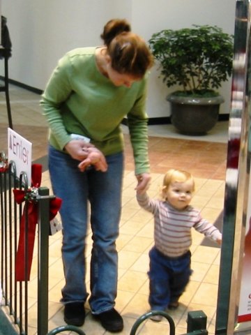 liliandmummywalkintoseesanta.jpg